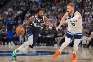 Kyrie Irving conduce ante Donte DiVincenzo